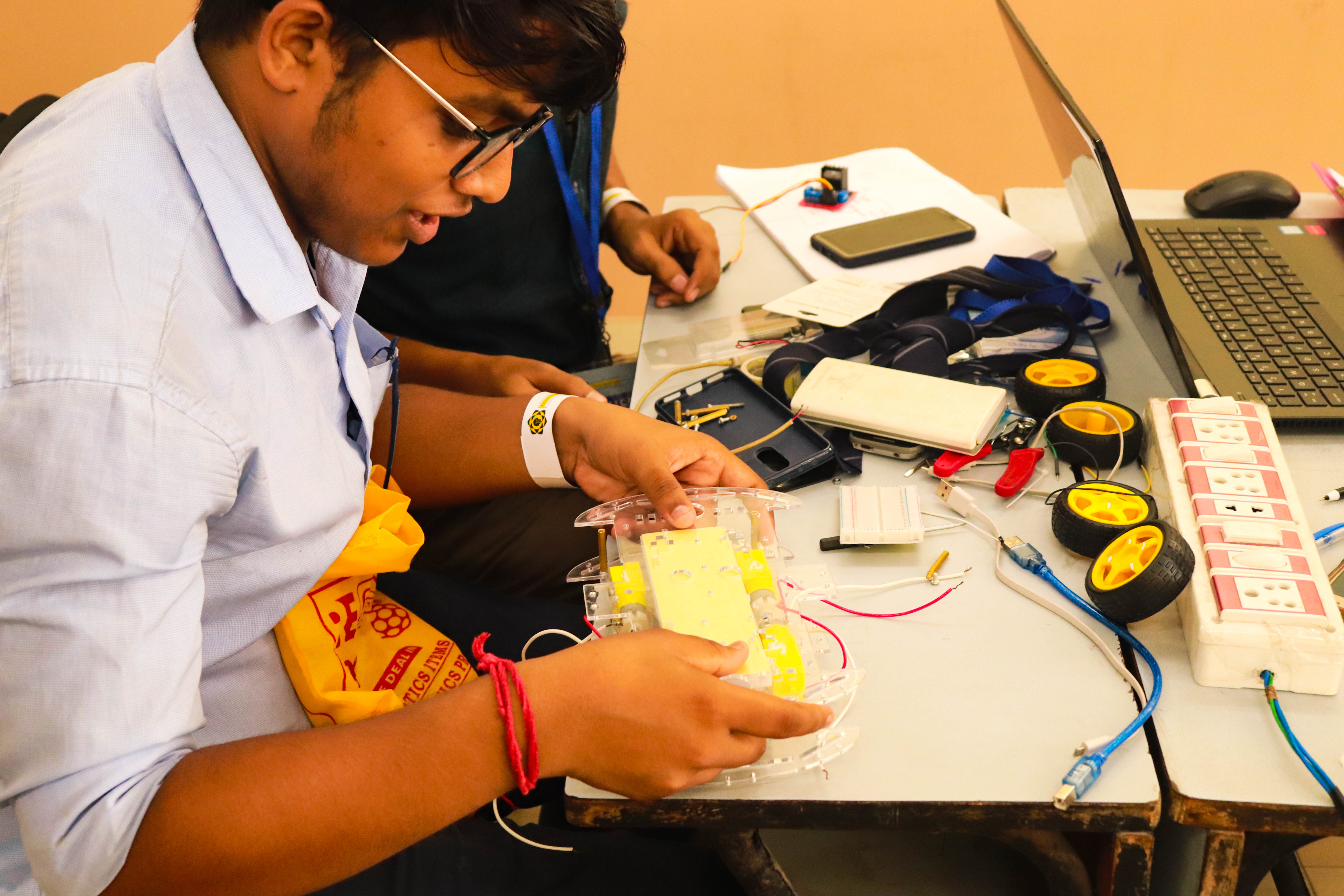 Students working with robots during the workshop